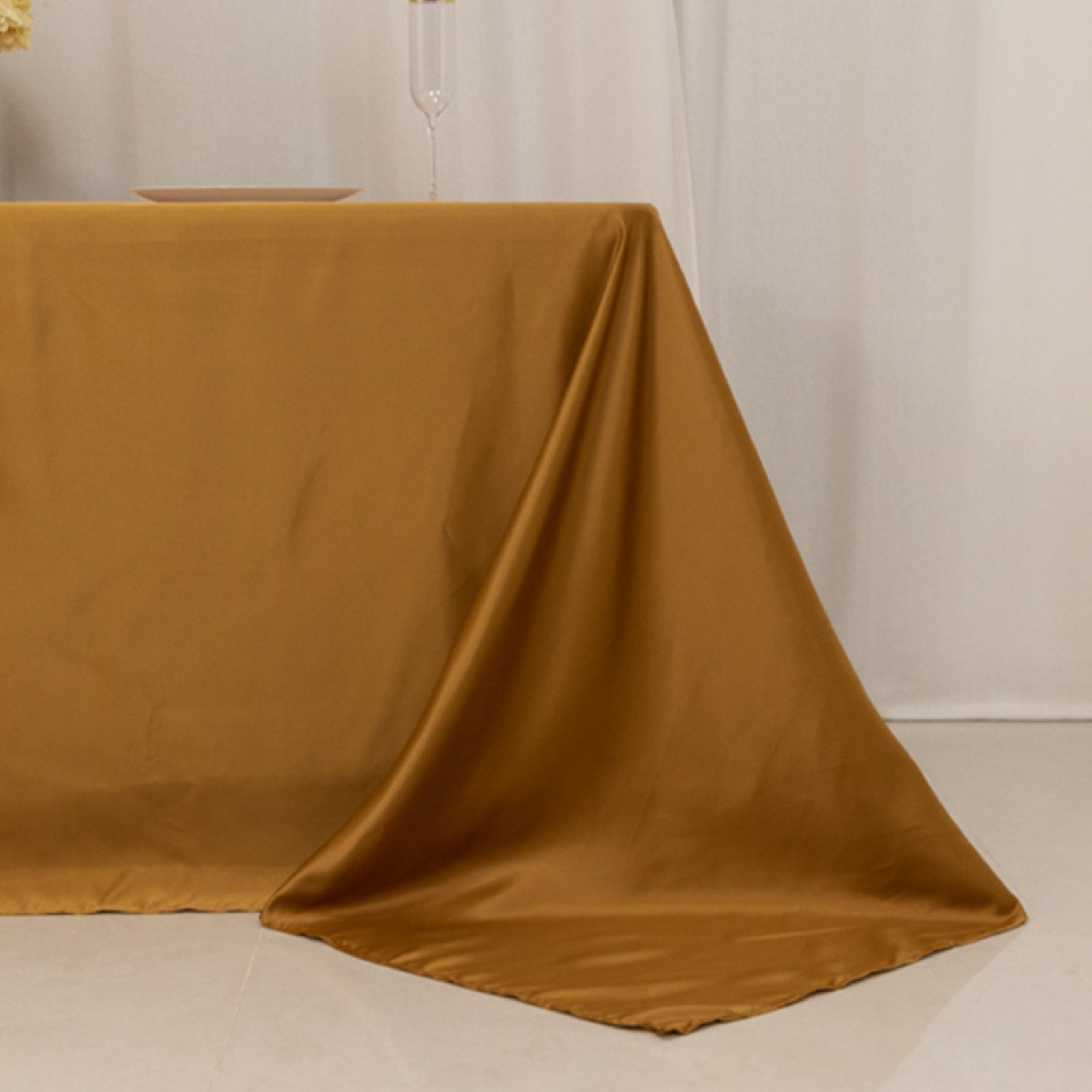 Luxurious Gold Lamour Satin 90x132 Rectangle Seamless Tablecloth for Weddings and Parties