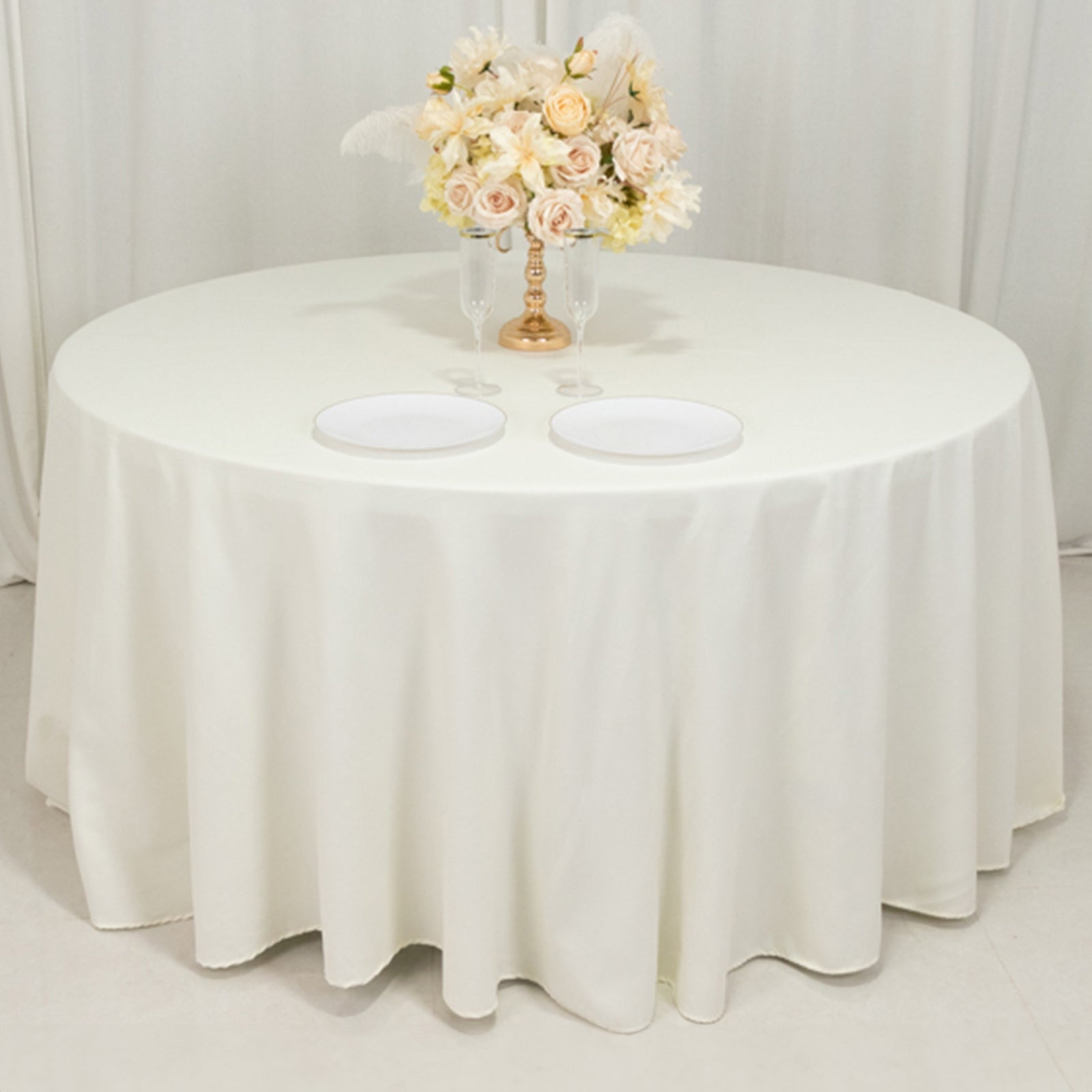 Ivory 120" Cotton Blend Seamless Wrinkle - Resistant Round Tablecloth: Ideal for Events