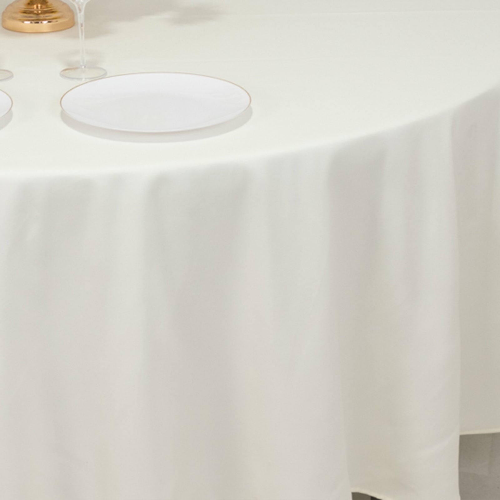 Get This Wrinkle-Resistant Ivory 108-Inch Cotton Blend Round Tablecloth Now