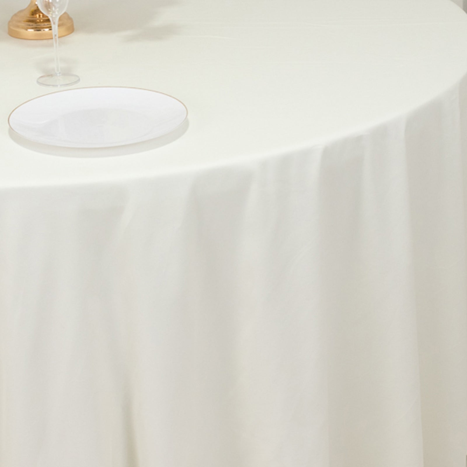 Ivory 120" Cotton Blend Seamless Wrinkle - Resistant Round Tablecloth: Ideal for Events