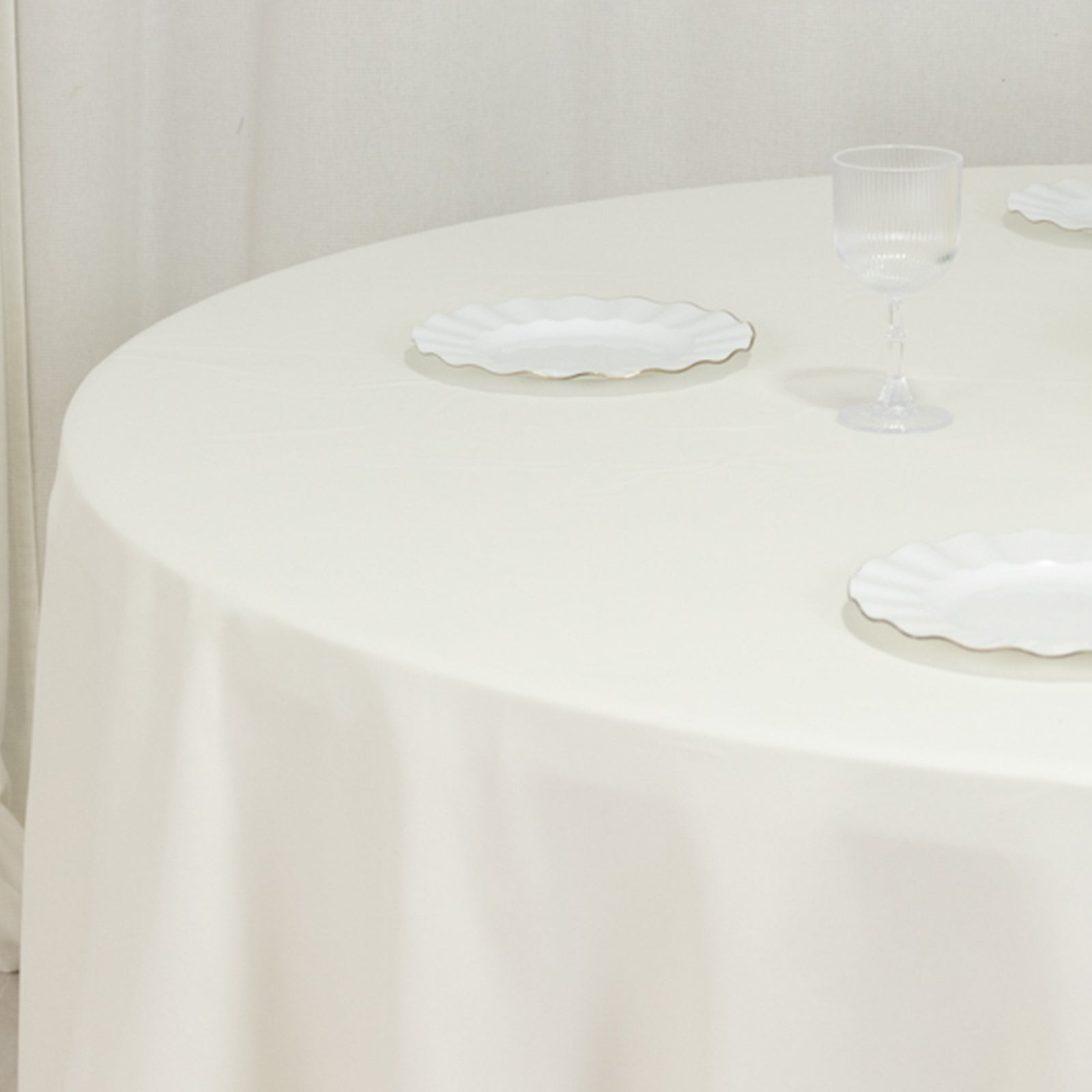 Ivory 120" Cotton Blend Seamless Wrinkle - Resistant Round Tablecloth: Ideal for Events