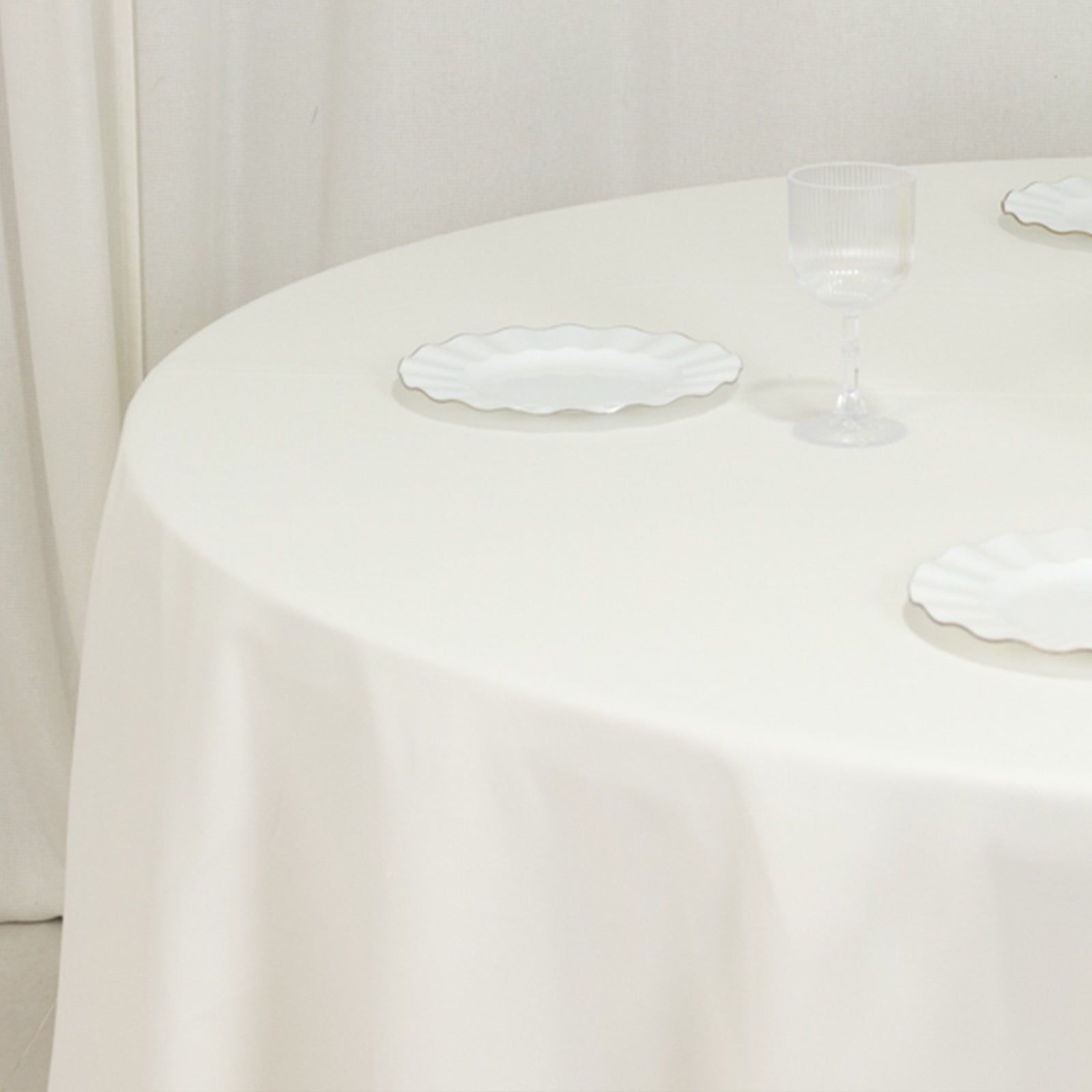 Get This Wrinkle-Resistant Ivory 108-Inch Cotton Blend Round Tablecloth Now