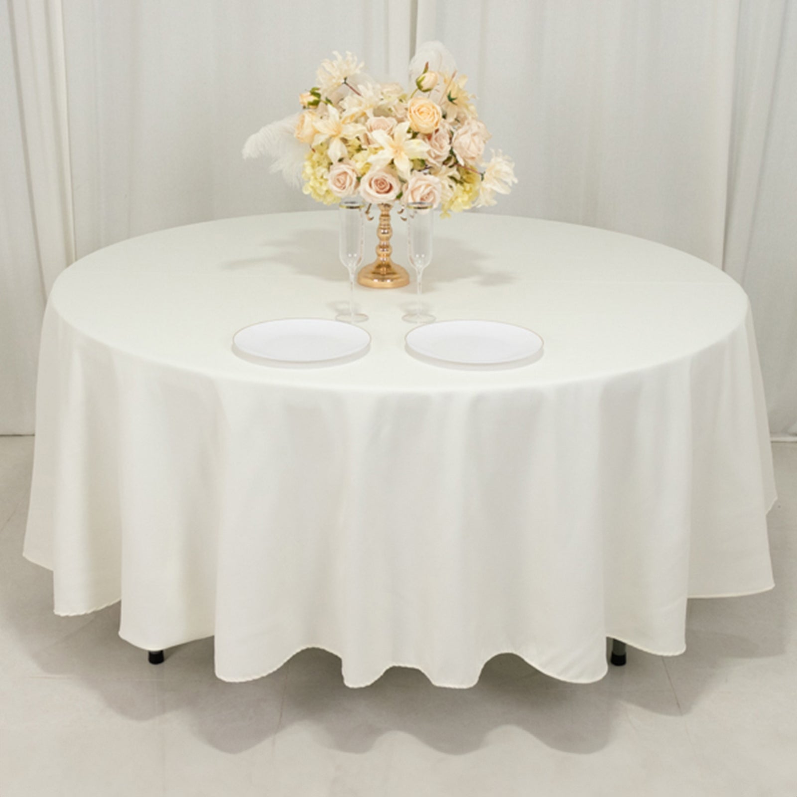 Get This Wrinkle-Resistant Ivory 108-Inch Cotton Blend Round Tablecloth Now
