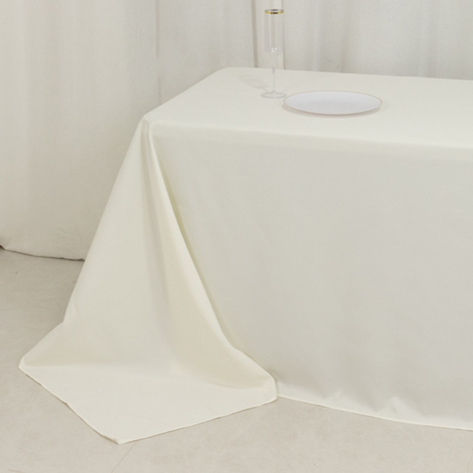 Ivory High - Performance Seamless Fire - Retardant Premium Polyester 90x156 Rectangular Tablecloth