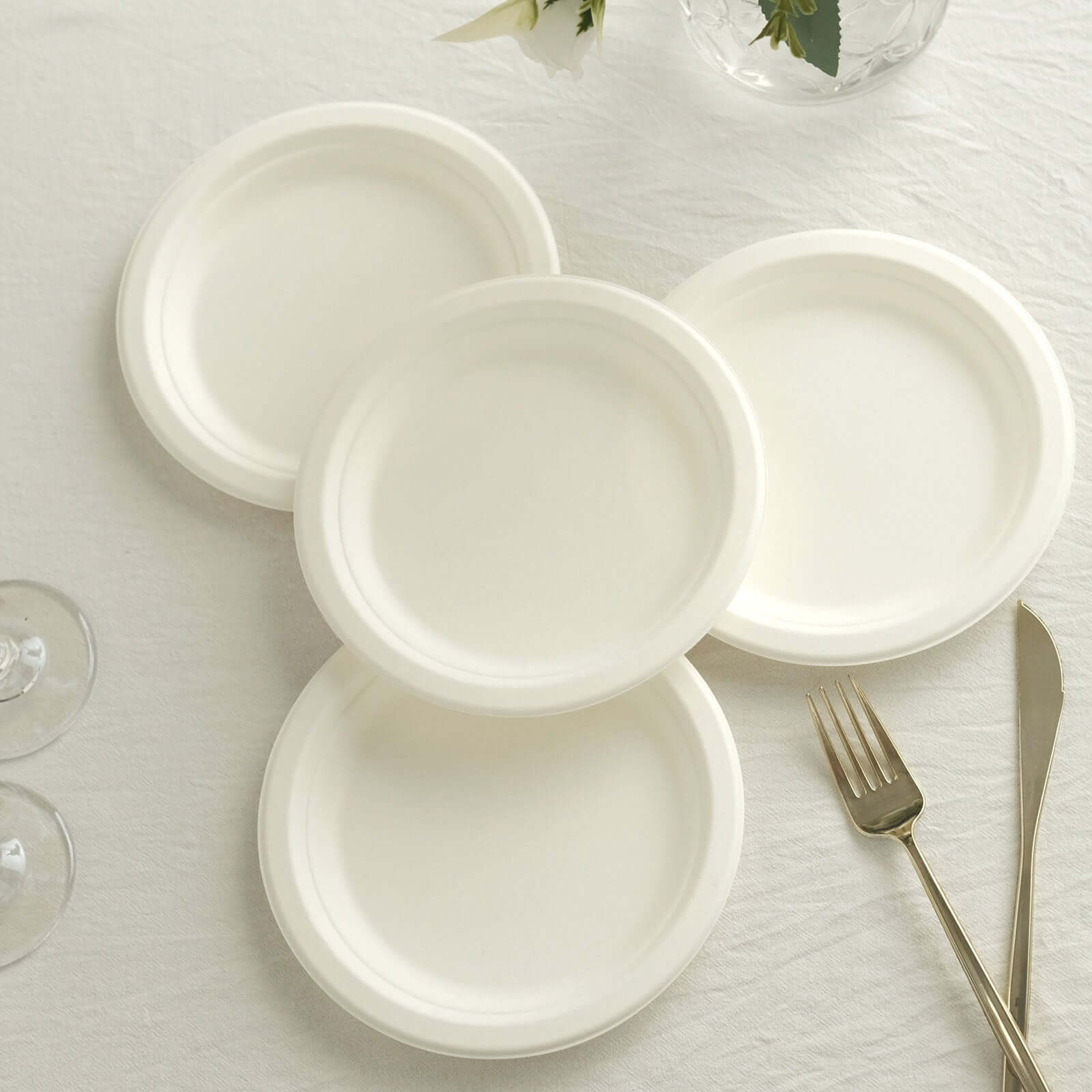 50-Pack White 7" Round Biodegradable Bagasse Dessert Plates - Ideal for Outdoor Events