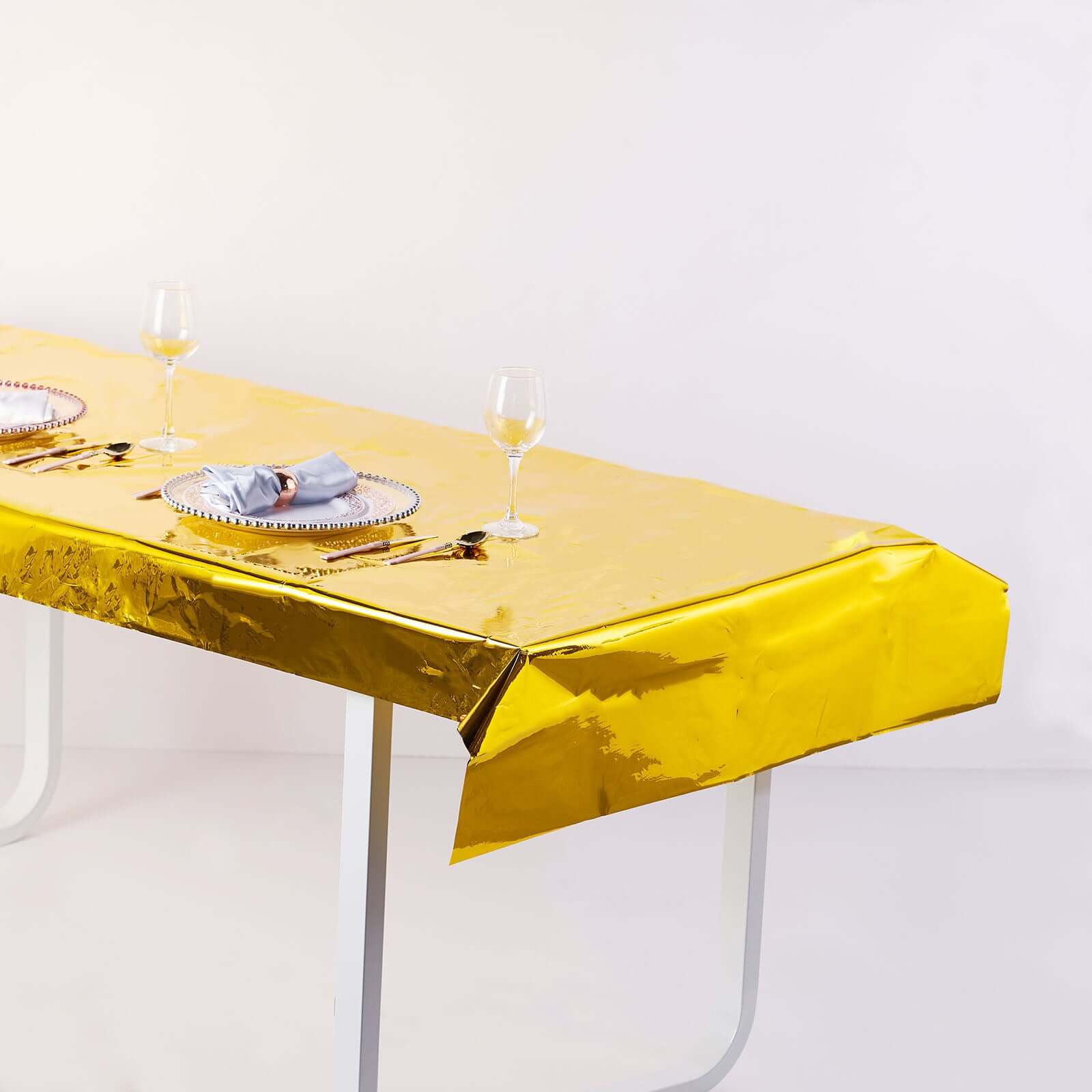 Disposable 40x90 Gold Metallic Foil Rectangle Plastic Tablecloth for Parties - Great Value!