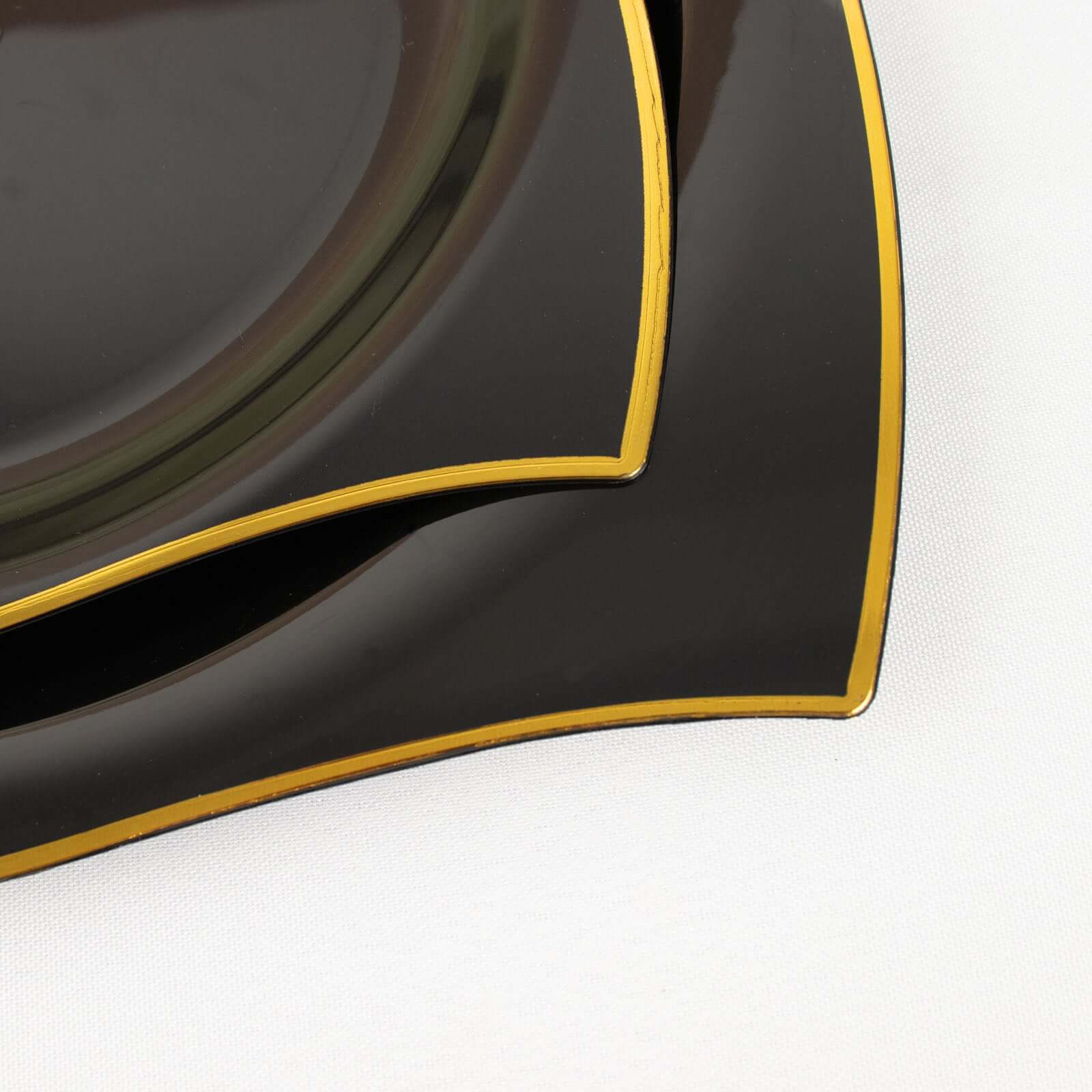Get 10-Pack Disposable Black Plastic Square Dinner Plates with Gold Wavy Rim for Modern Parties