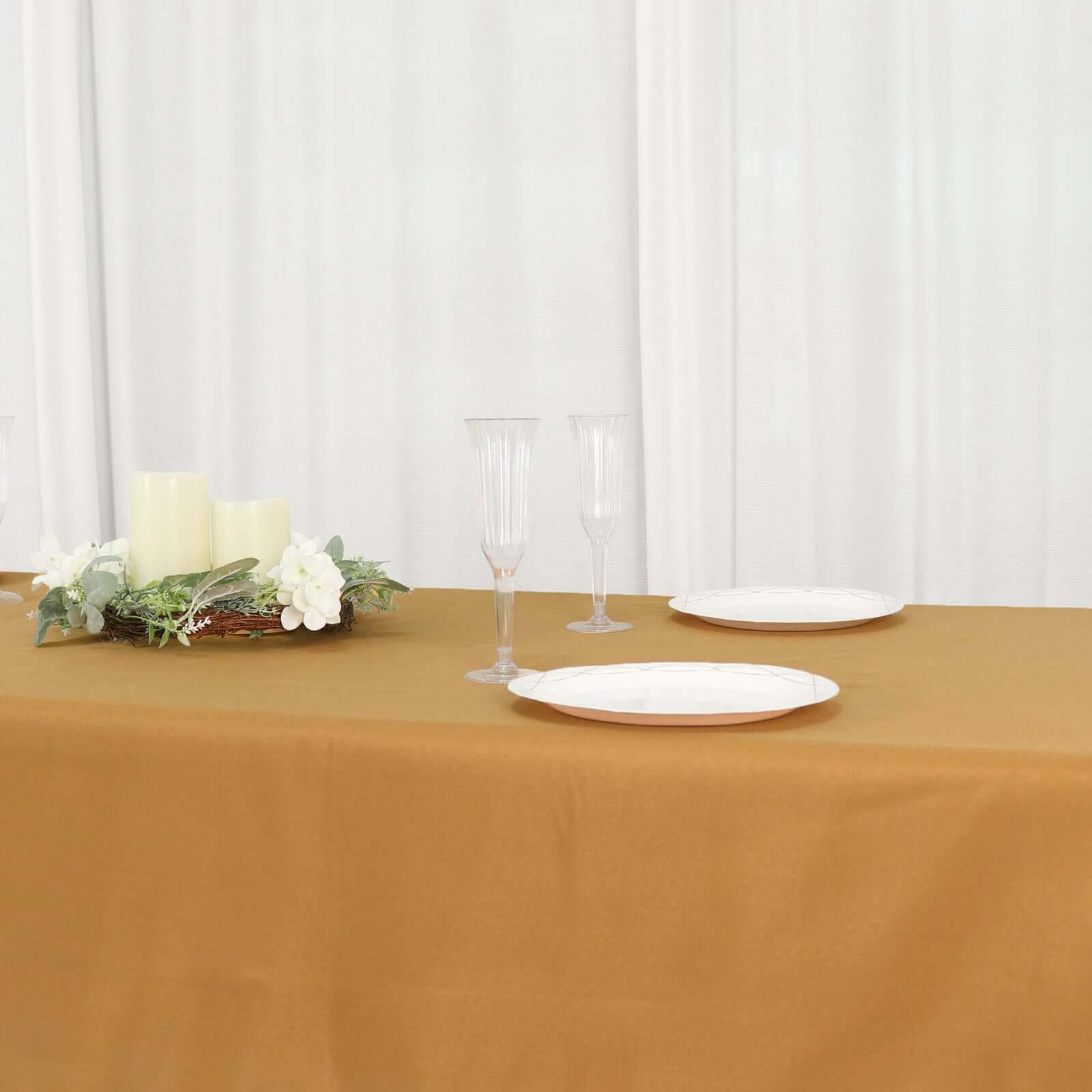 Wrinkle-Resistant Gold Polyester Rectangle Tablecloth 54x96 for Weddings and Events - Easy Care!