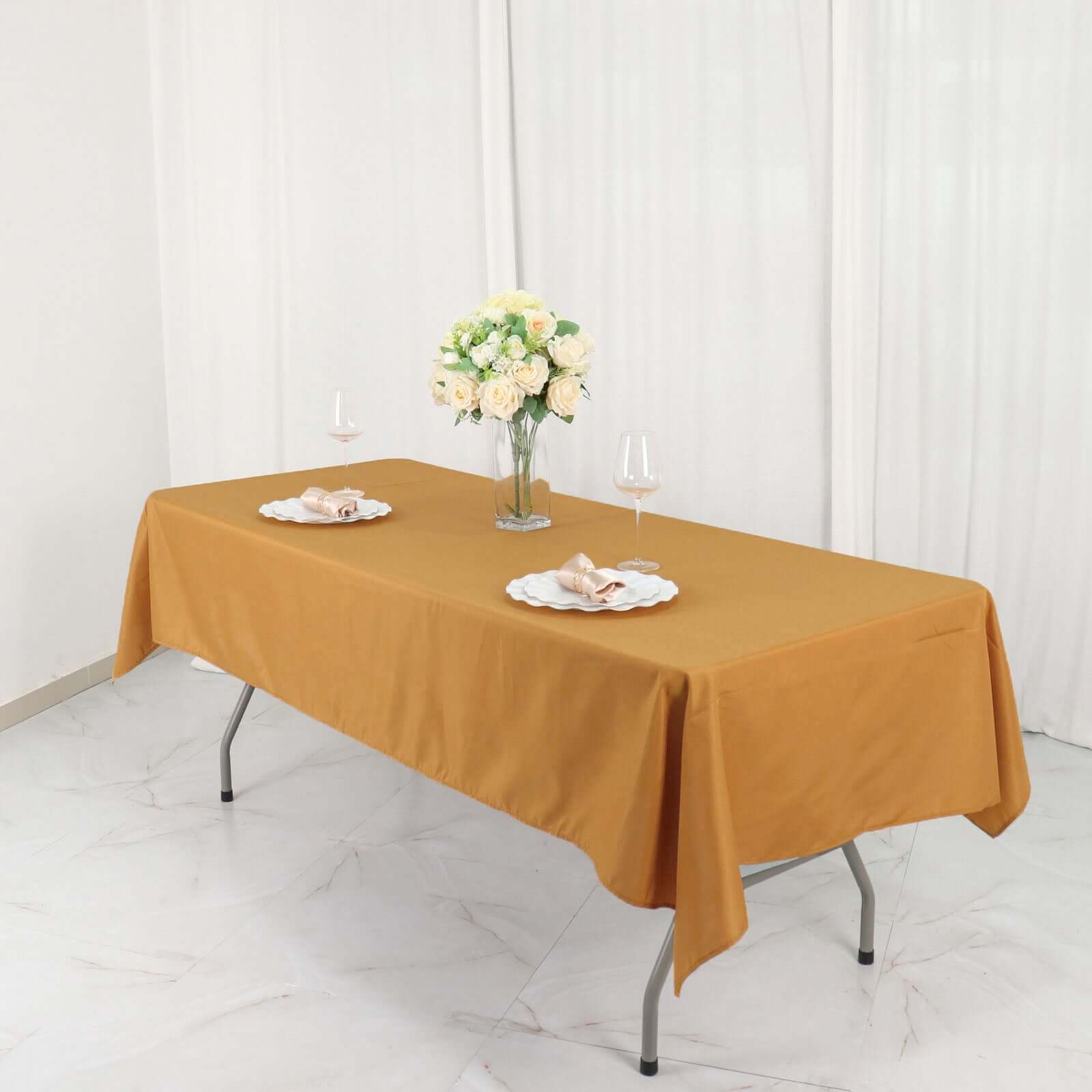 Wrinkle-Resistant Gold Polyester Rectangle Tablecloth 54x96 for Weddings and Events - Easy Care!
