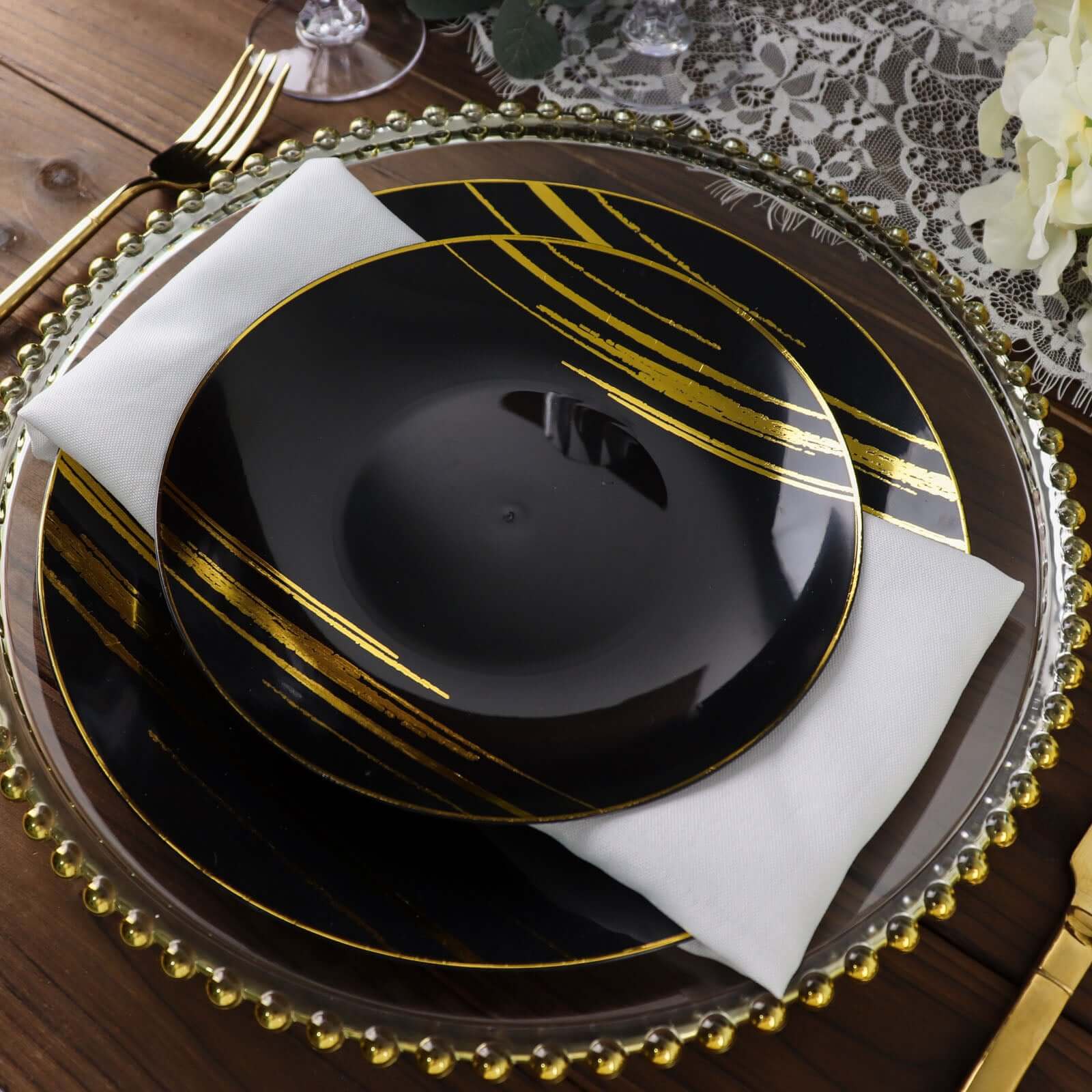 10-Piece Set of Disposable Black Plastic Dessert Plates with Gold Brush Print for Modern Events