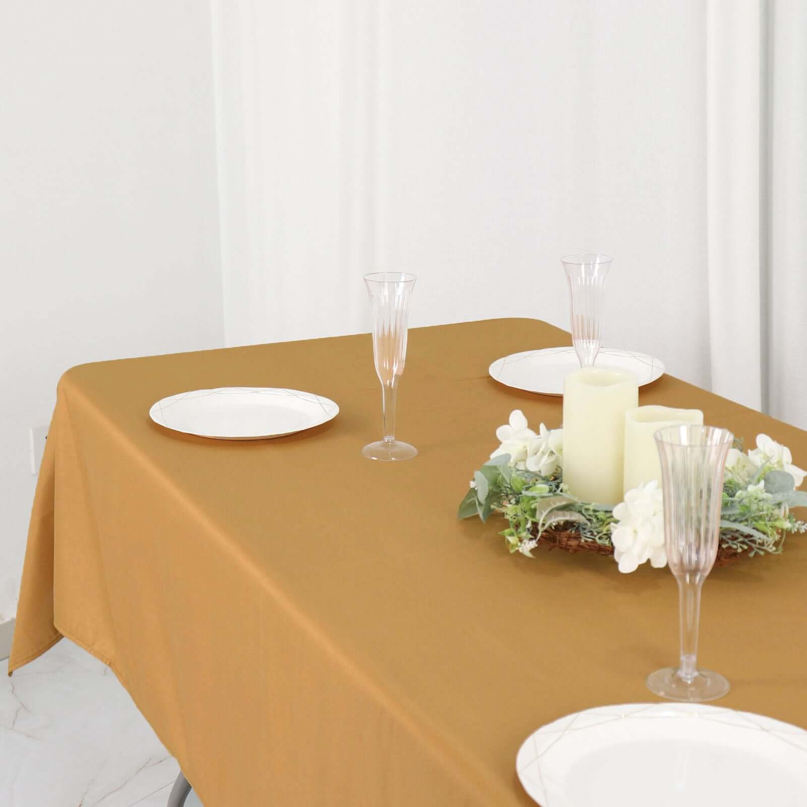 Wrinkle-Resistant Gold Polyester Rectangle Tablecloth 54x96 for Weddings and Events - Easy Care!