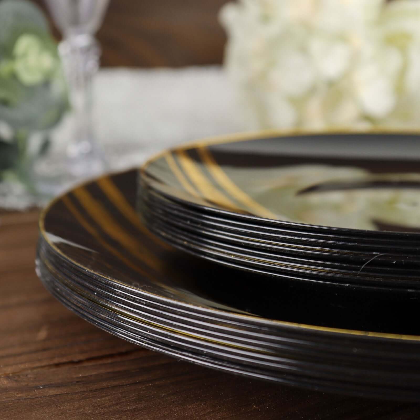 10-Piece Set of Disposable Black Plastic Dessert Plates with Gold Brush Print for Modern Events