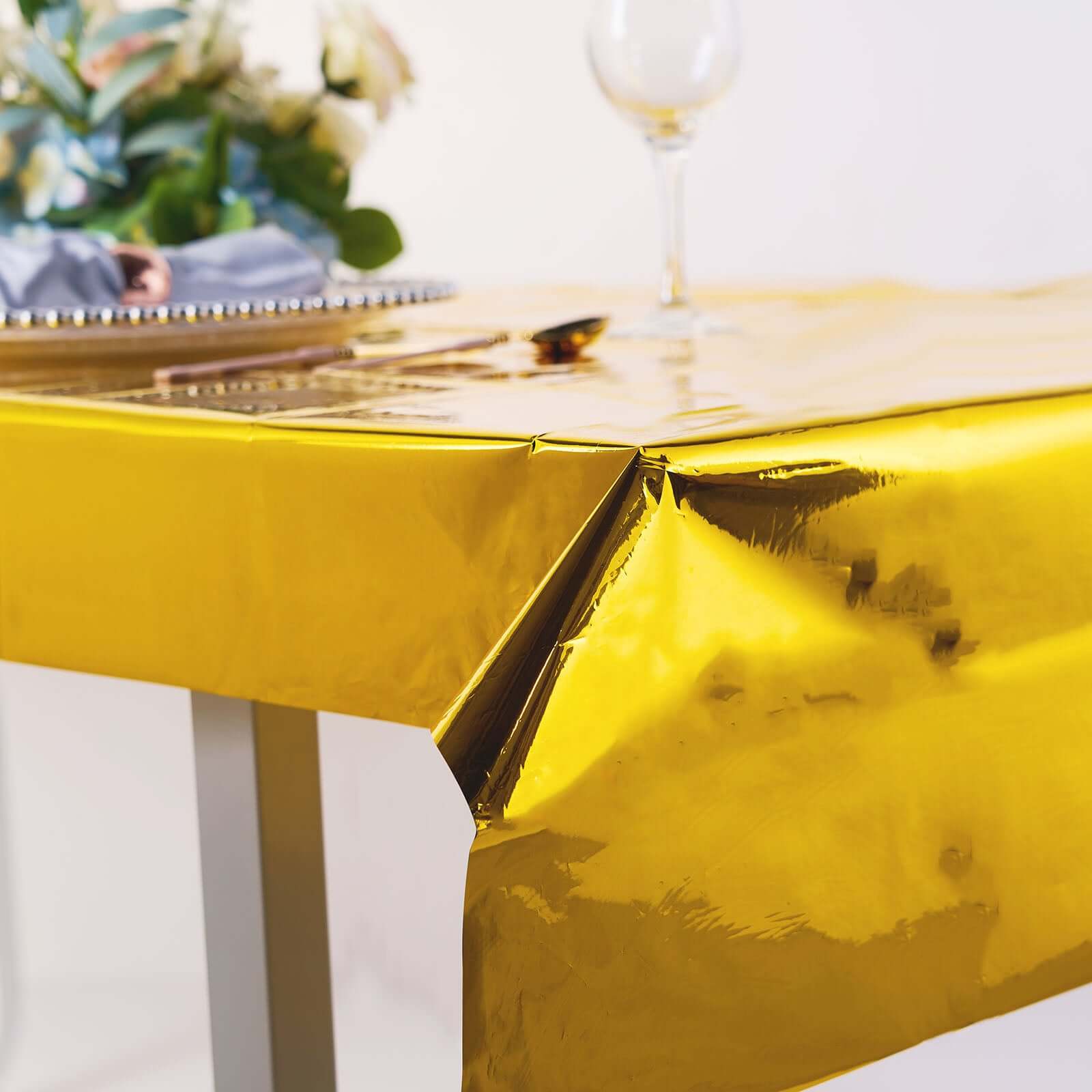 Disposable 40x90 Gold Metallic Foil Rectangle Plastic Tablecloth for Parties - Great Value!