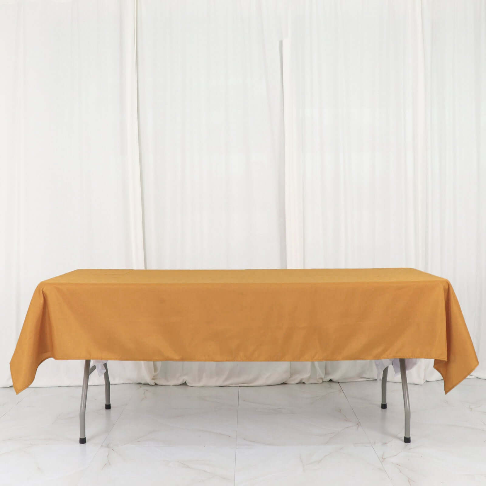 Wrinkle-Resistant Gold Polyester Rectangle Tablecloth 54x96 for Weddings and Events - Easy Care!