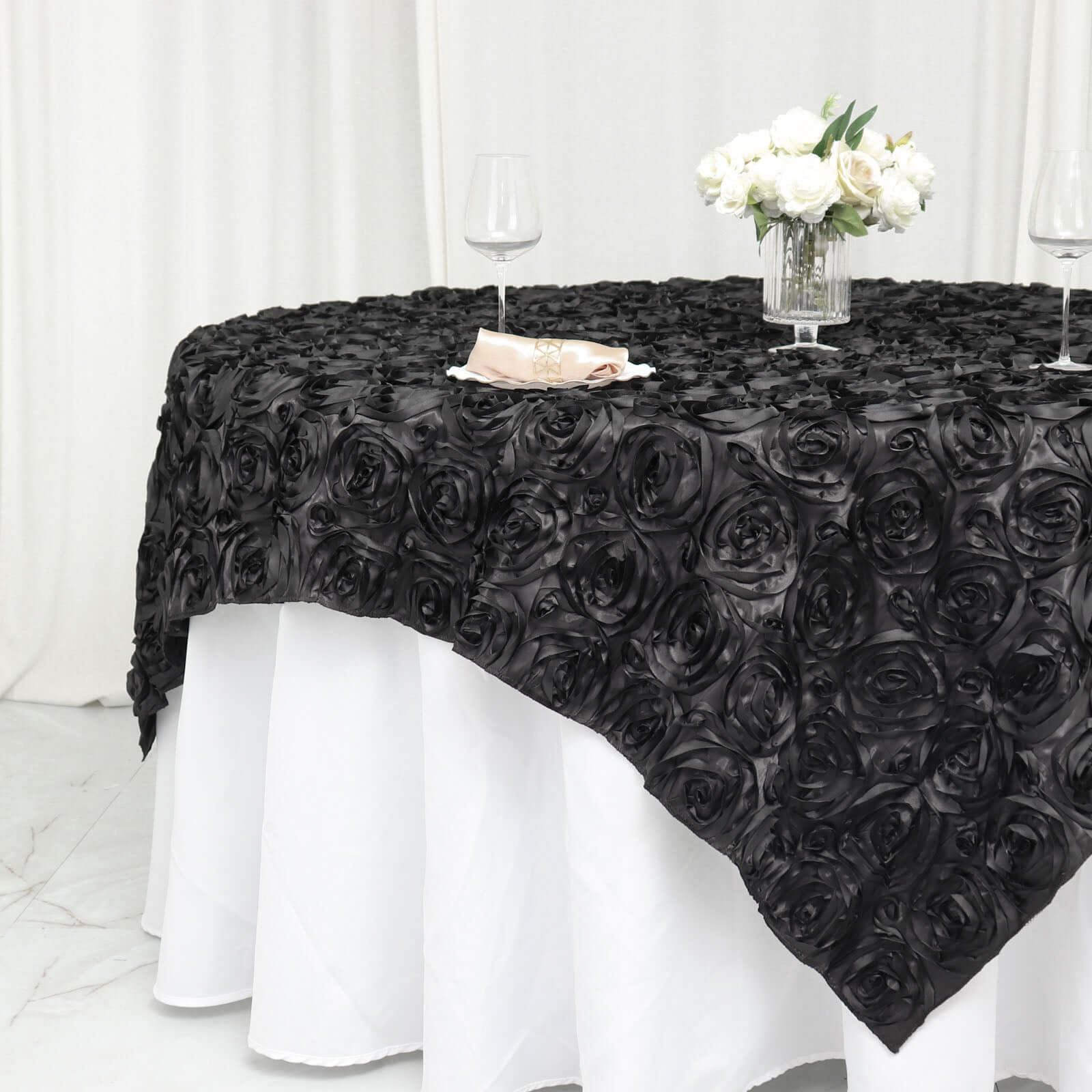Black 72x72 Satin Square Table Overlay with 3D Rosette Design - Ideal for Stylish Events