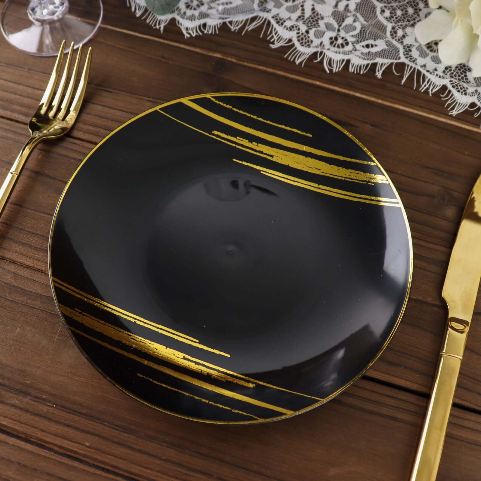 10-Piece Set of Disposable Black Plastic Dessert Plates with Gold Brush Print for Modern Events