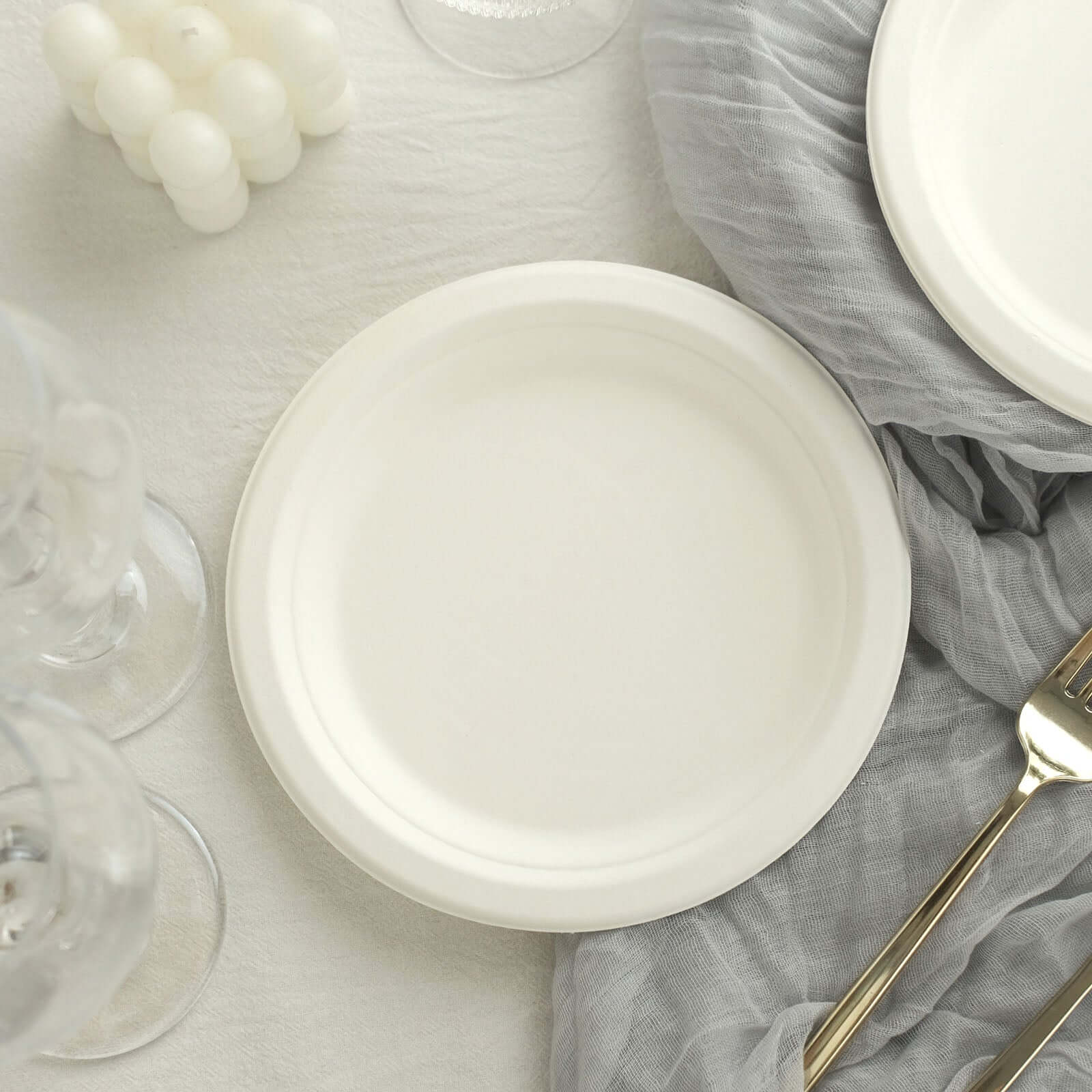 50-Pack White 7" Round Biodegradable Bagasse Dessert Plates - Ideal for Outdoor Events