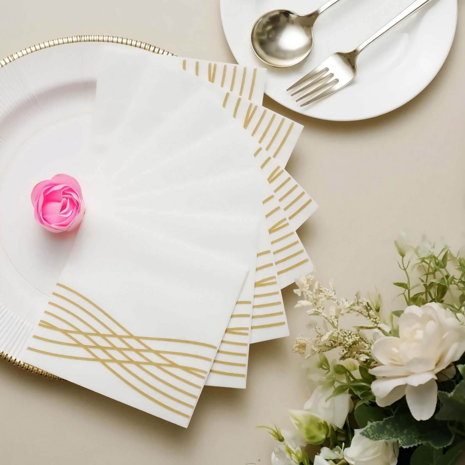 20-Piece Set of White Airlaid Cocktail Napkins with Gold Foil Wave Design