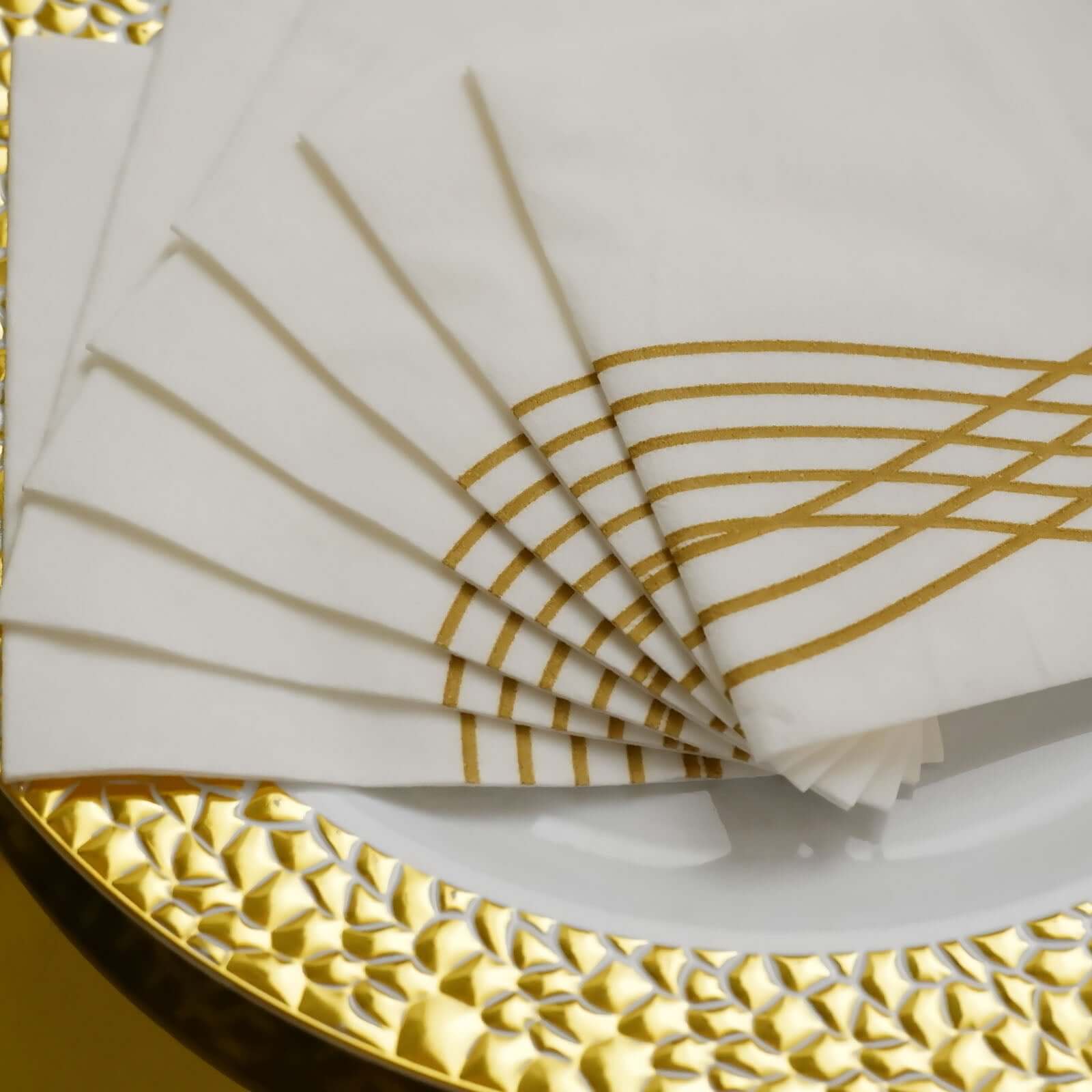 20-Piece Set of White Airlaid Cocktail Napkins with Gold Foil Wave Design