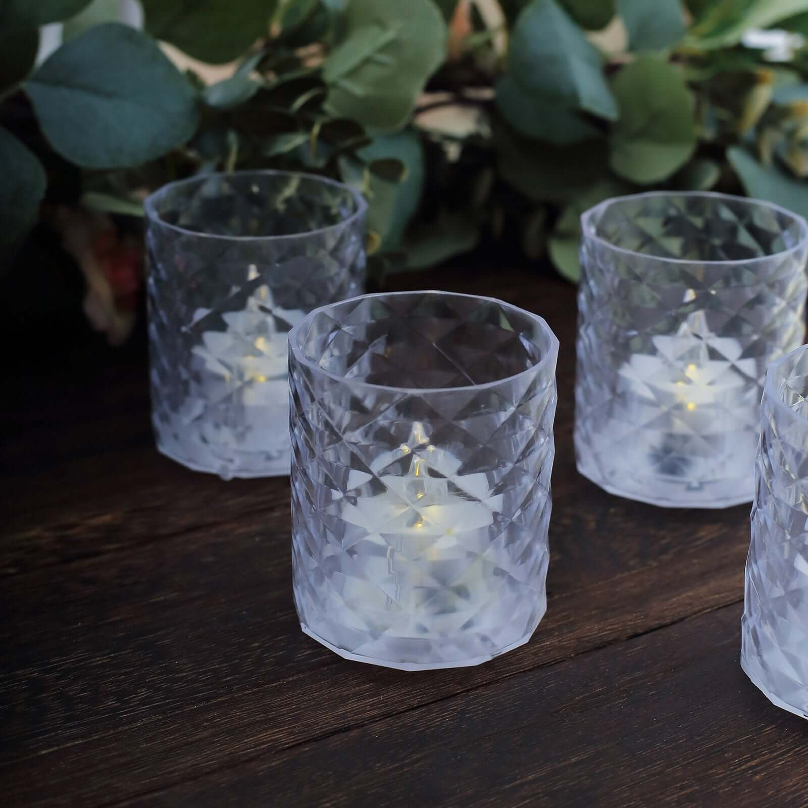 12-Piece Set of Clear LED Tealight Candle Holders in Whiskey Glass Design with Warm White Battery-Operated Lights
